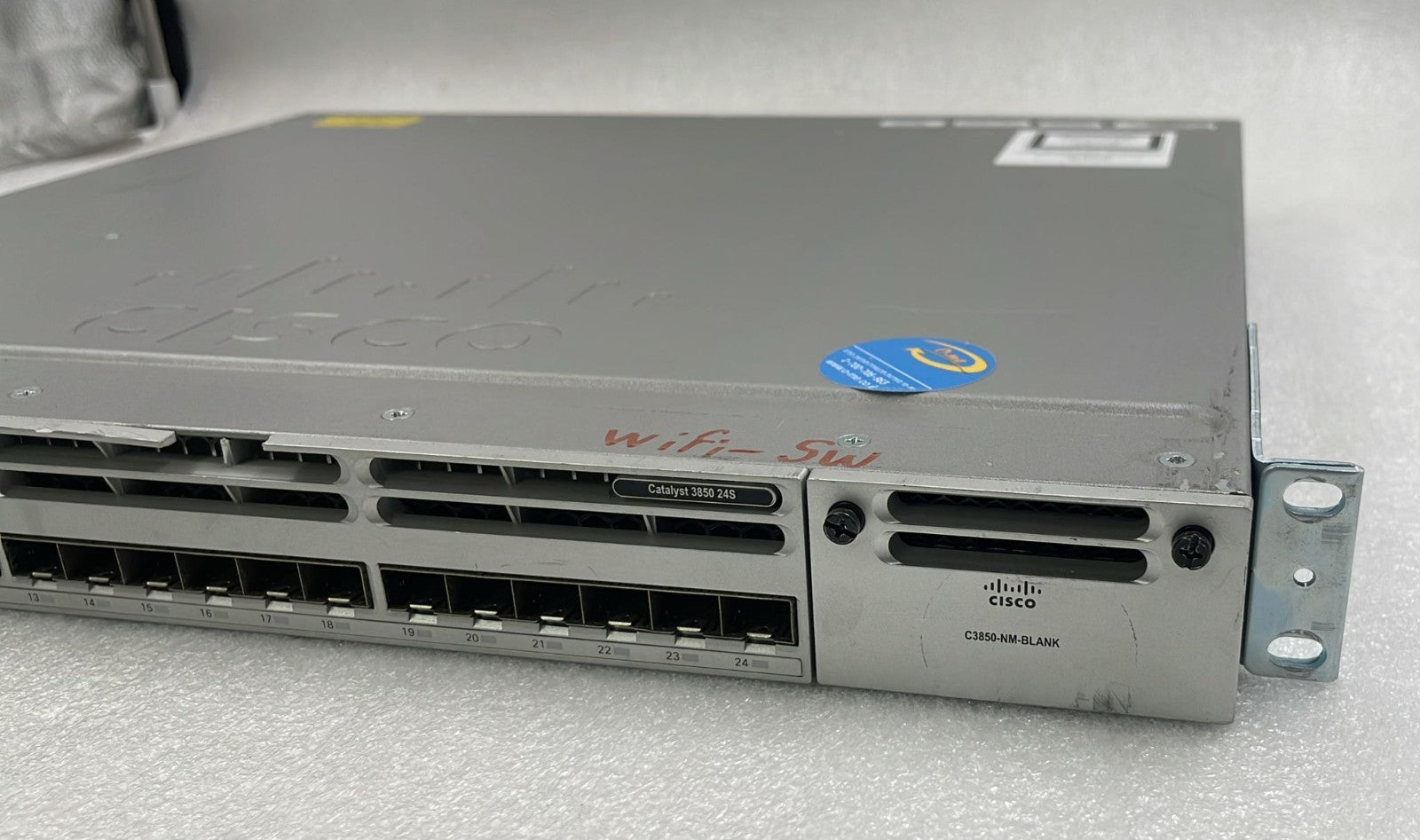 Cisco WS-C3850-24S-S front panel branding view
