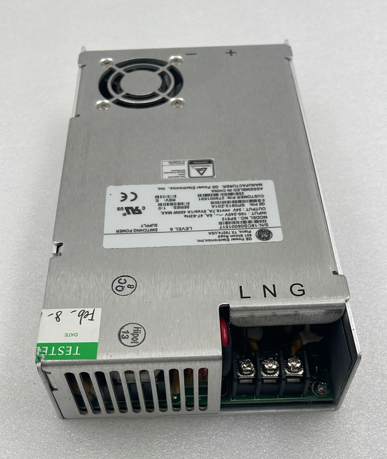 GE SP812 power supply module angled view showing ventilation