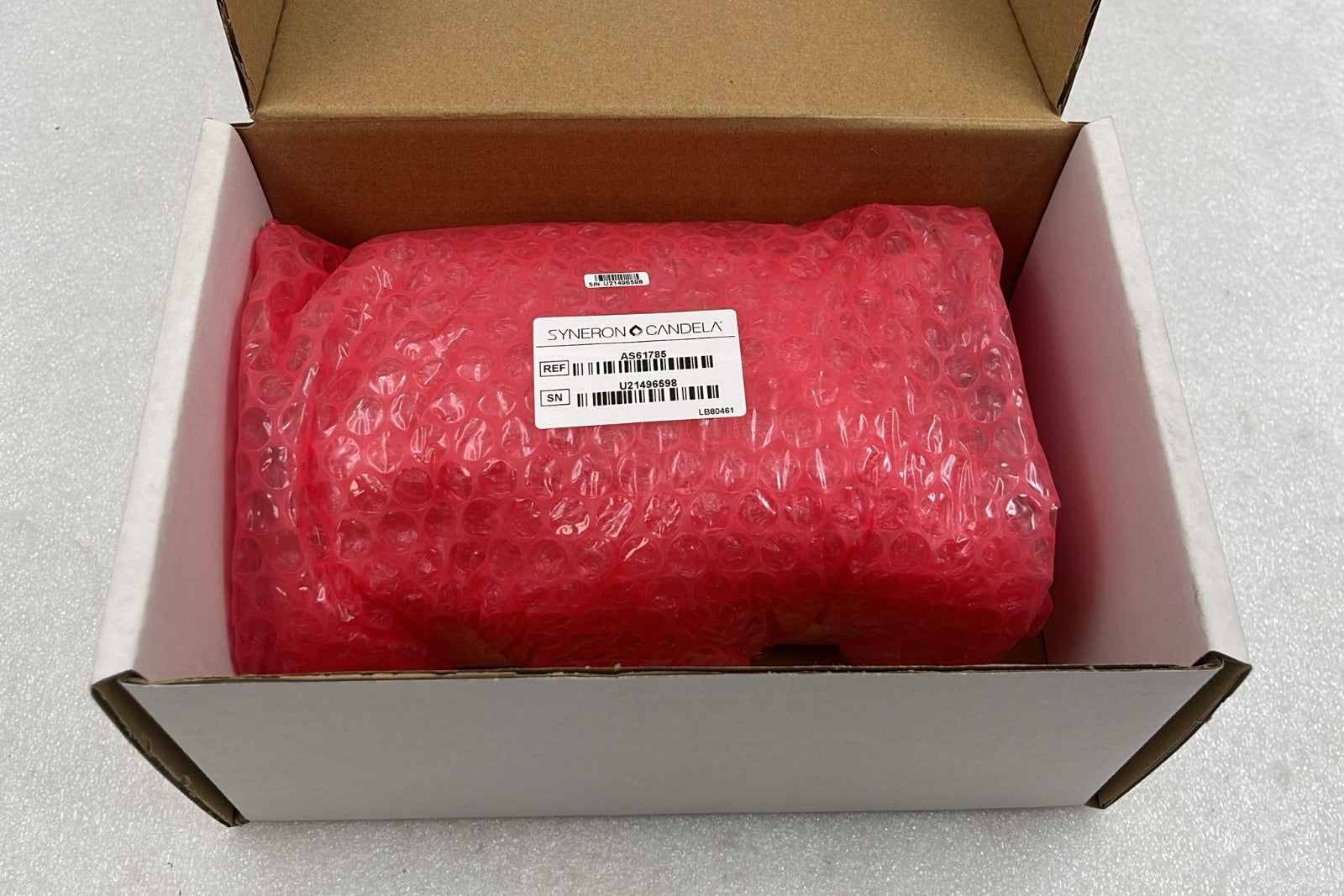Syneron Candela HV charger PCB in protective packaging