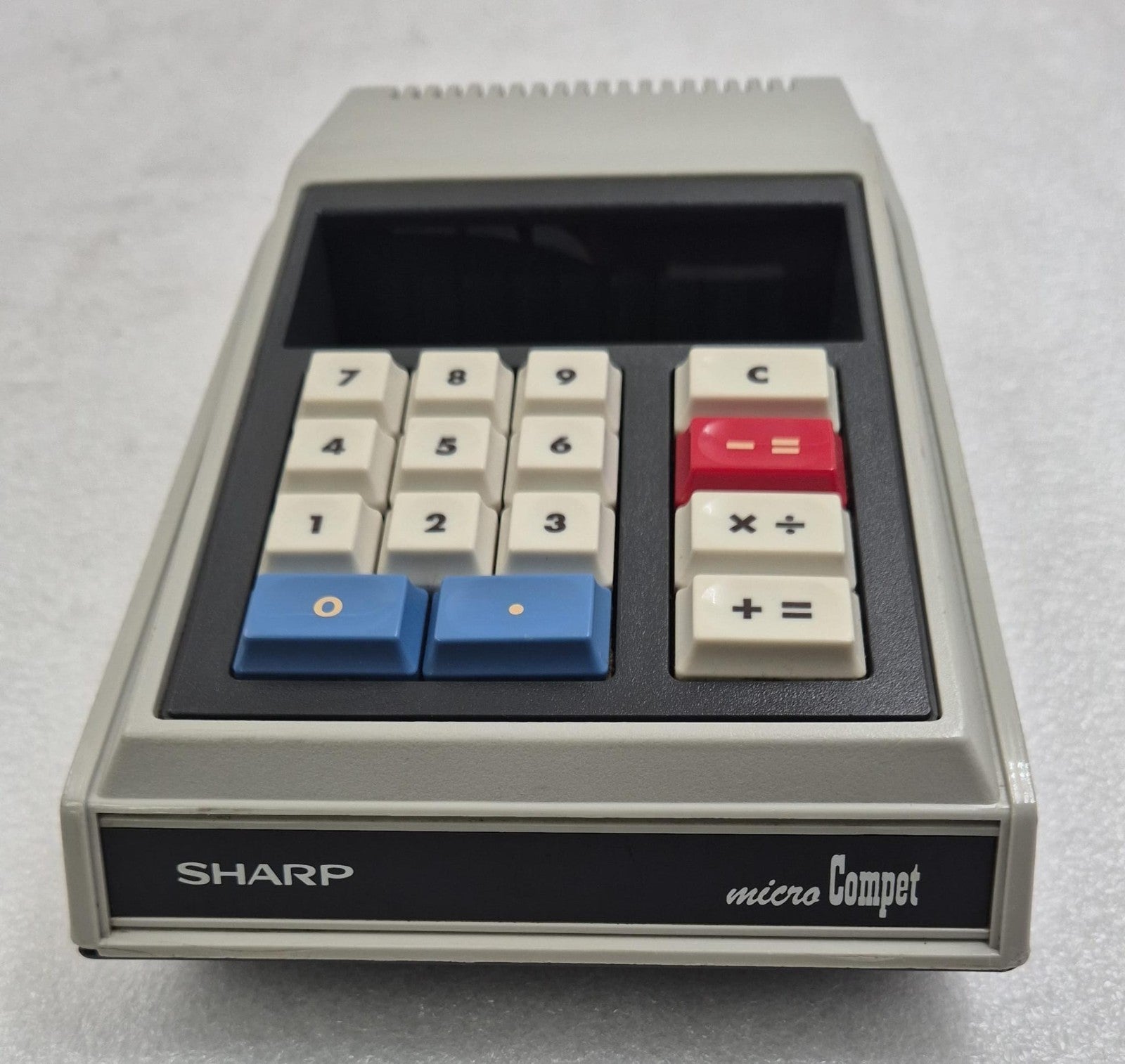Sharp QT-8D Micro Compet electronic desktop calculator with compact early-generation calculator design