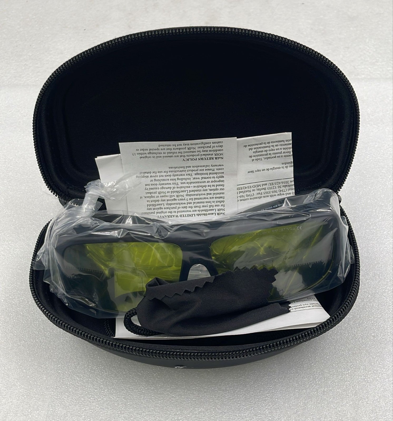 Laser safety glasses inside carrying case