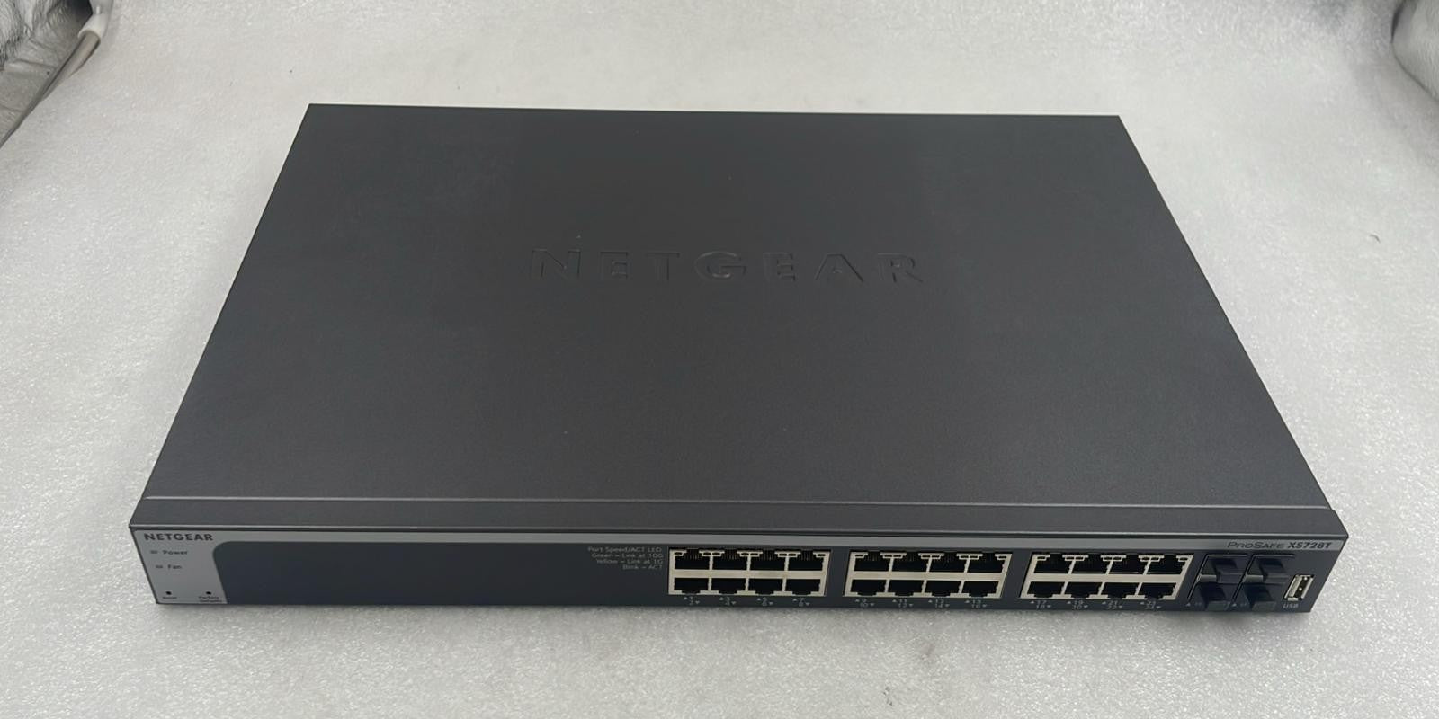 Netgear XS728T-100NES 28-port 10-Gigabit smart managed Pro network switch front panel view