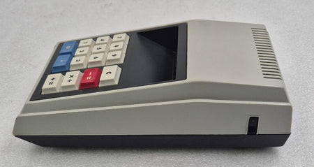 Sharp QT-8D Micro Compet electronic desktop calculator with compact early-generation calculator design