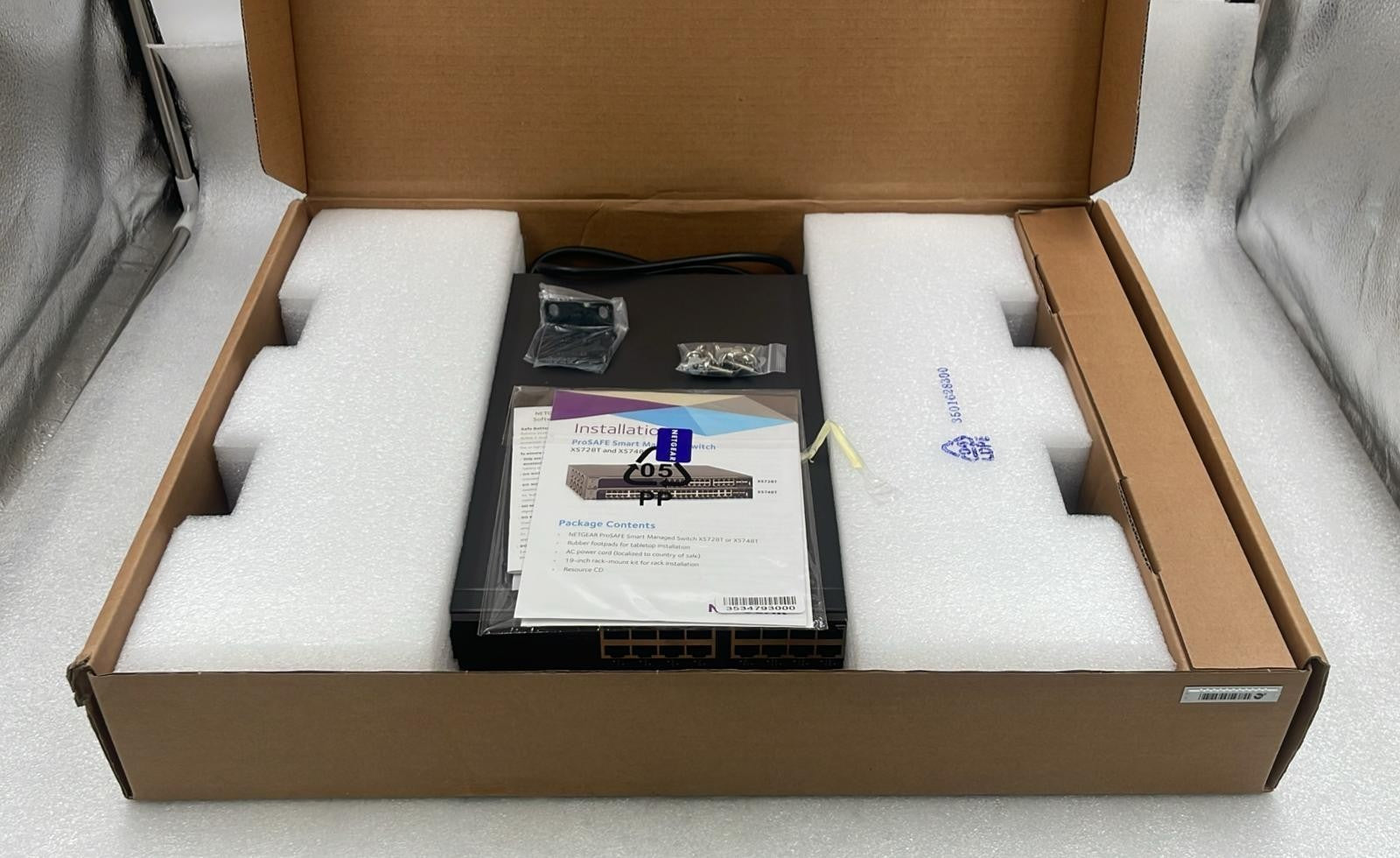 Netgear XS728T-100NES 28-port 10-Gigabit smart managed Pro network switch front panel view