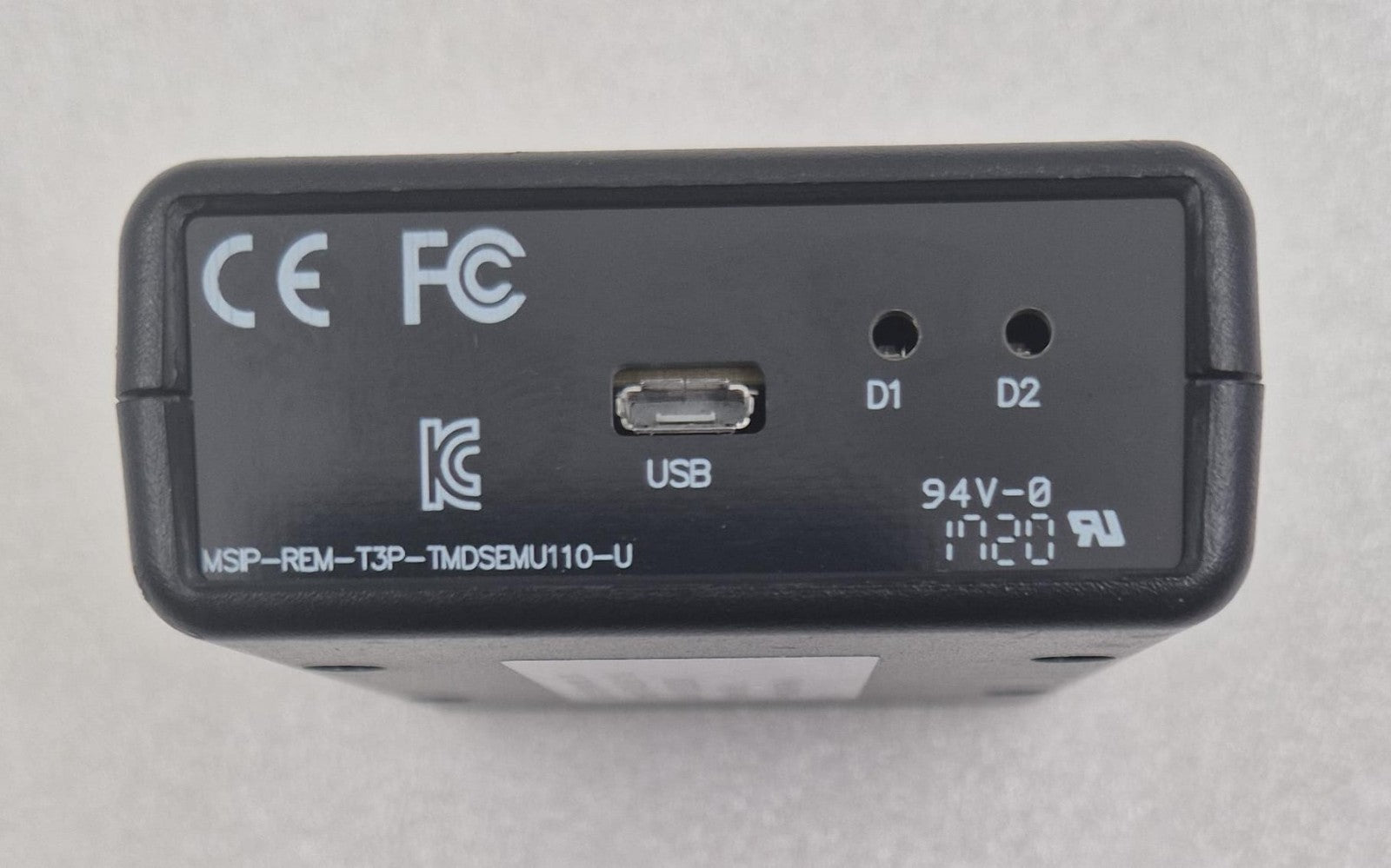 Texas Instruments XDS110 debug probe USB and indicator ports