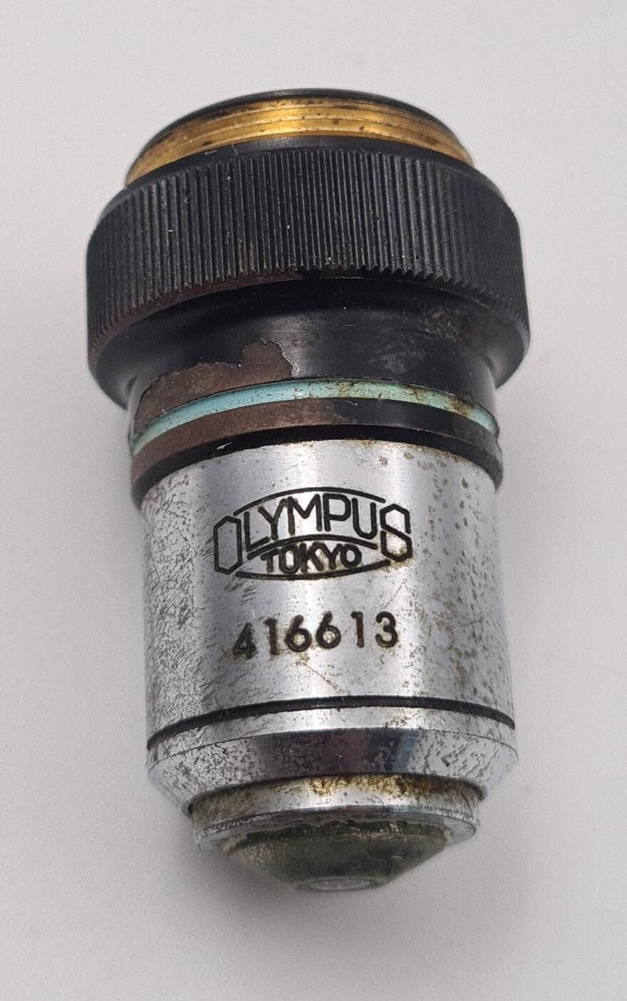 Olympus HI PLAN 10x 0.25 NA microscope objective lens front view
