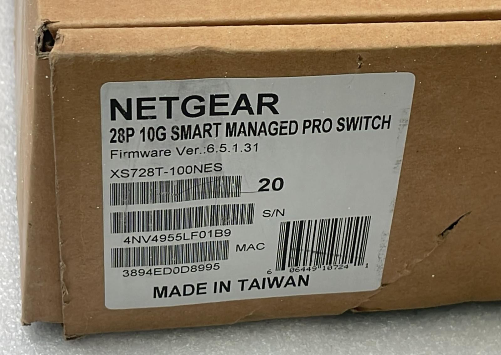 Netgear XS728T-100NES 28-port 10-Gigabit smart managed Pro network switch front panel view