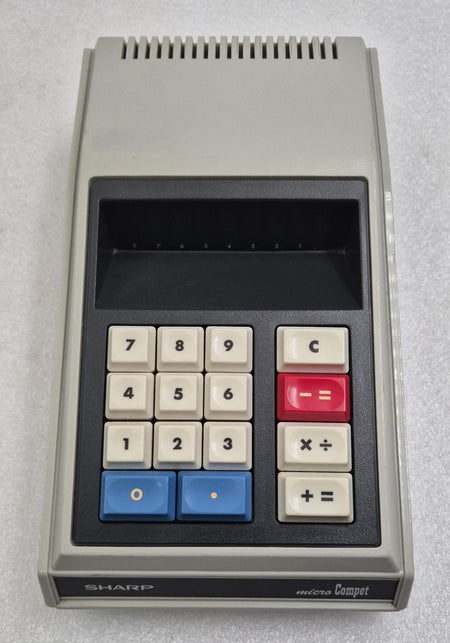 Sharp QT-8D Micro Compet electronic desktop calculator with compact early-generation calculator design