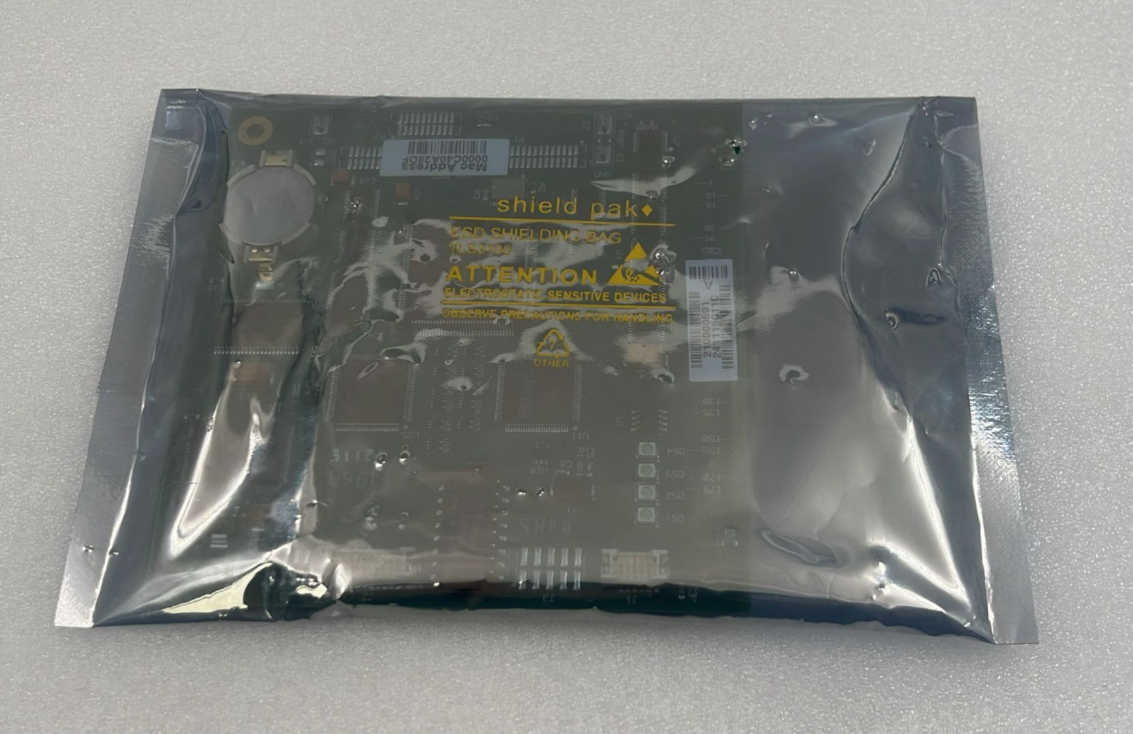 Waters 210000691 PCB board in anti-static packaging