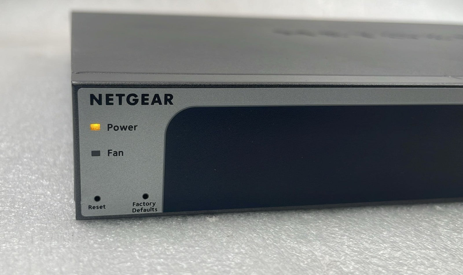 Netgear XS728T-100NES power and status indicator panel