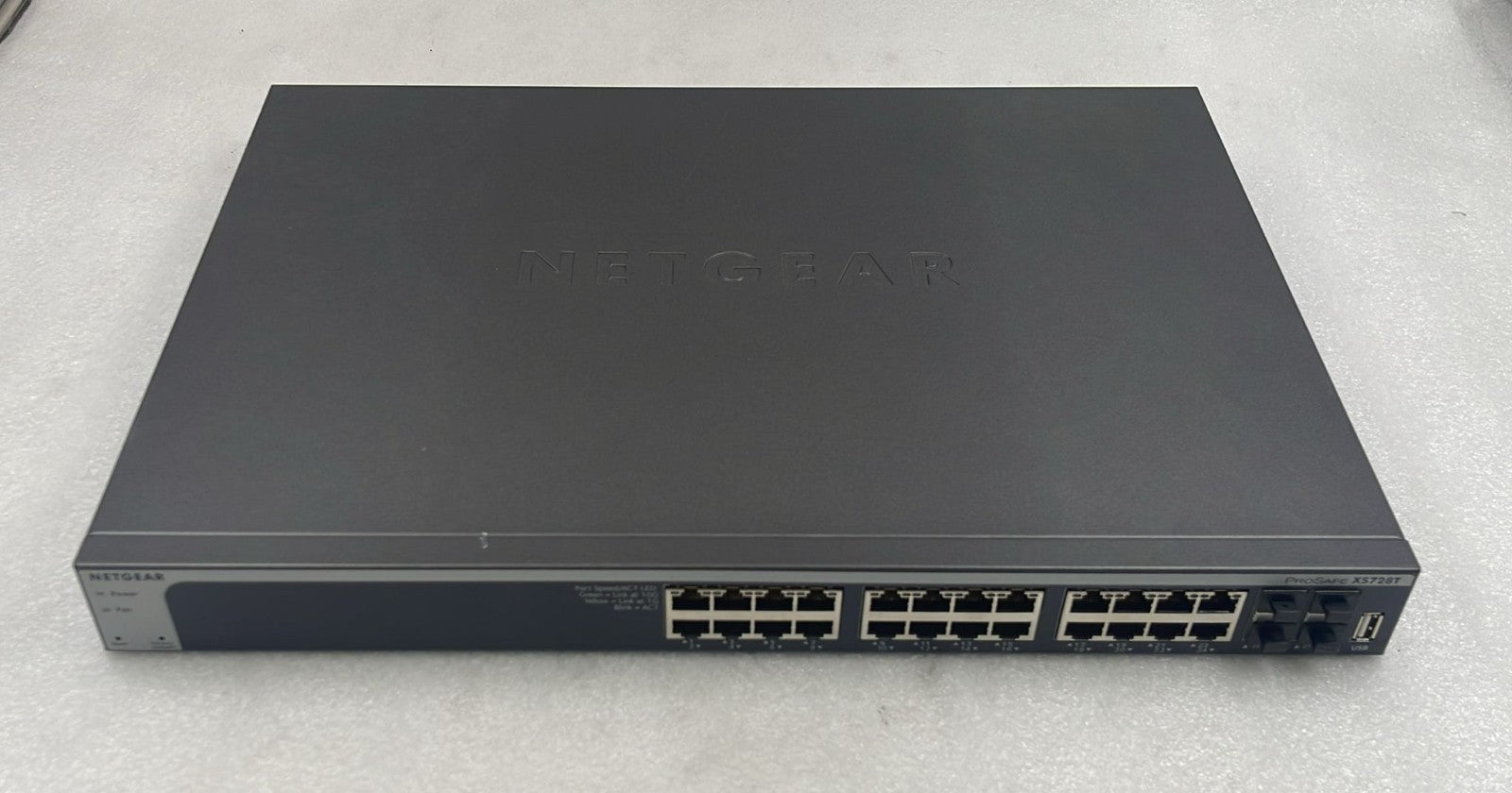 Netgear XS728T-100NES 28-port 10-gigabit network switch front view