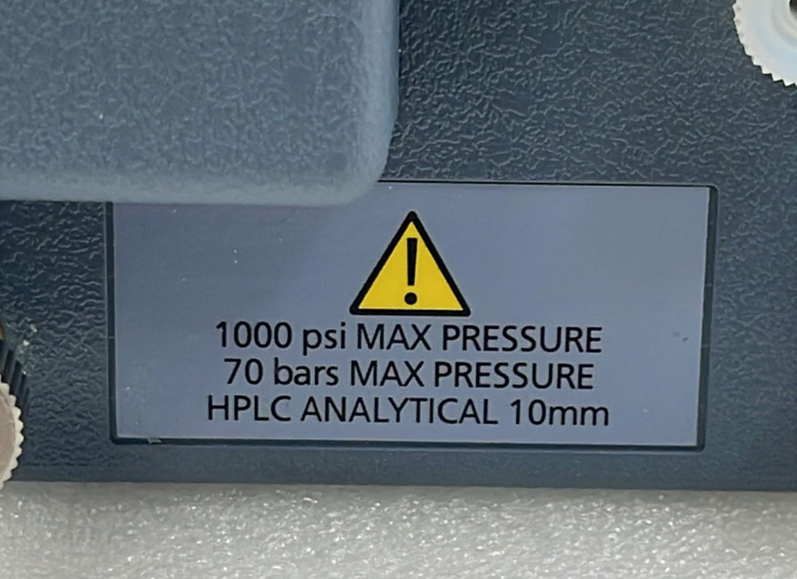 Waters Alliance 289007906 pressure rating label close-up
