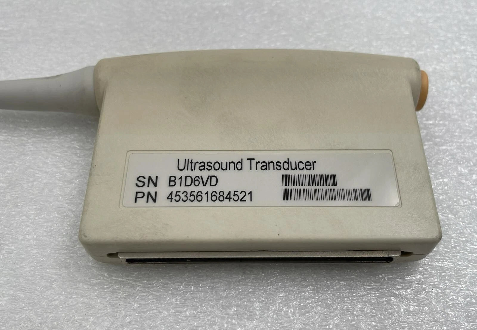 Philips C8-4v ultrasound probe serial label close-up