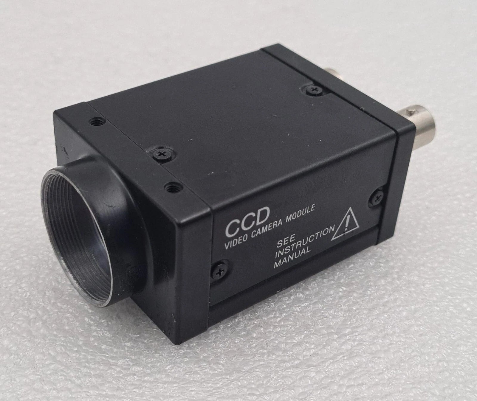Sony XC-ST30 CCD video industrial camera module front view with lens mount