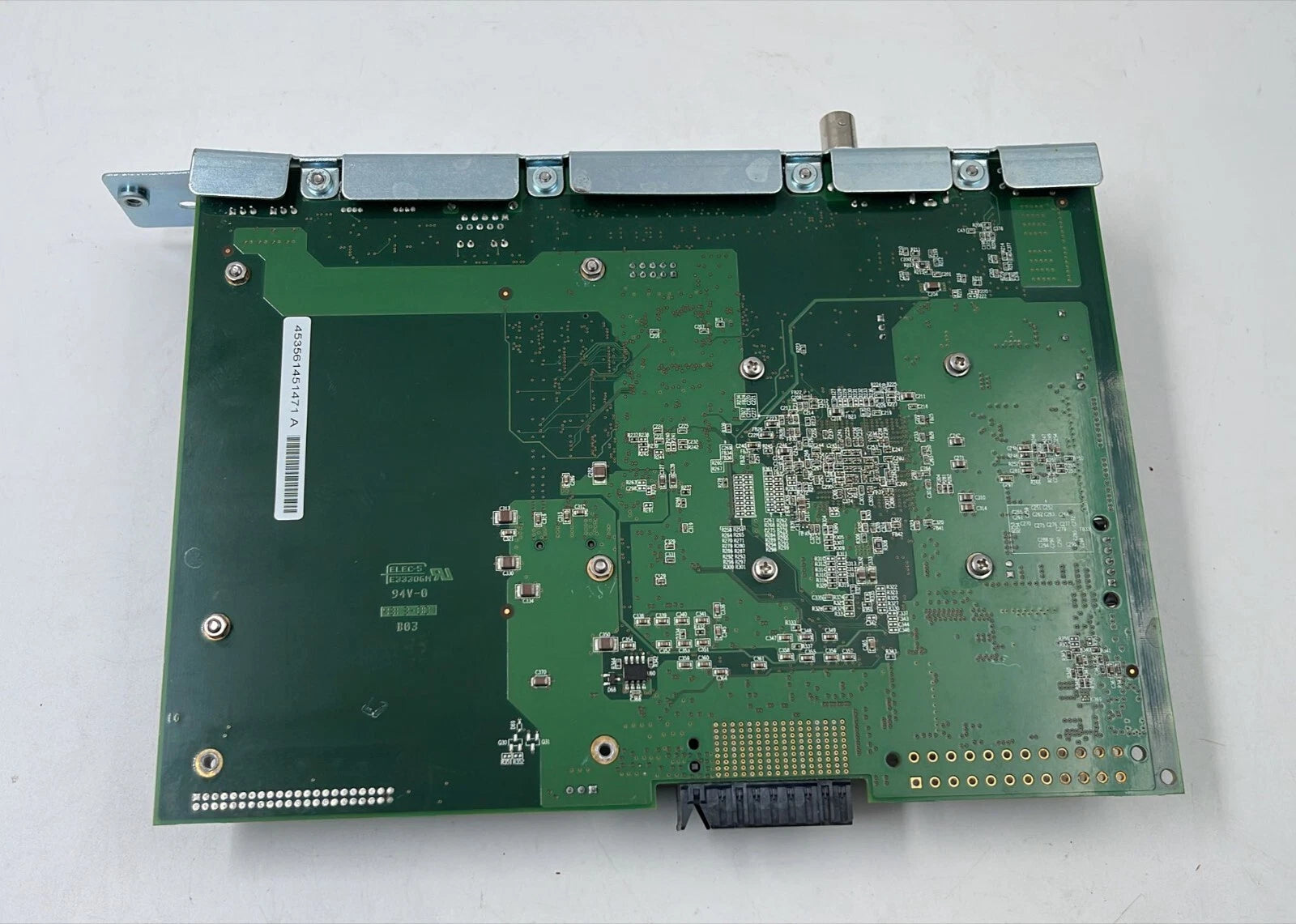 Kontron 801-138 771-119-D0 embedded industrial control board with heatsink and I/O ports