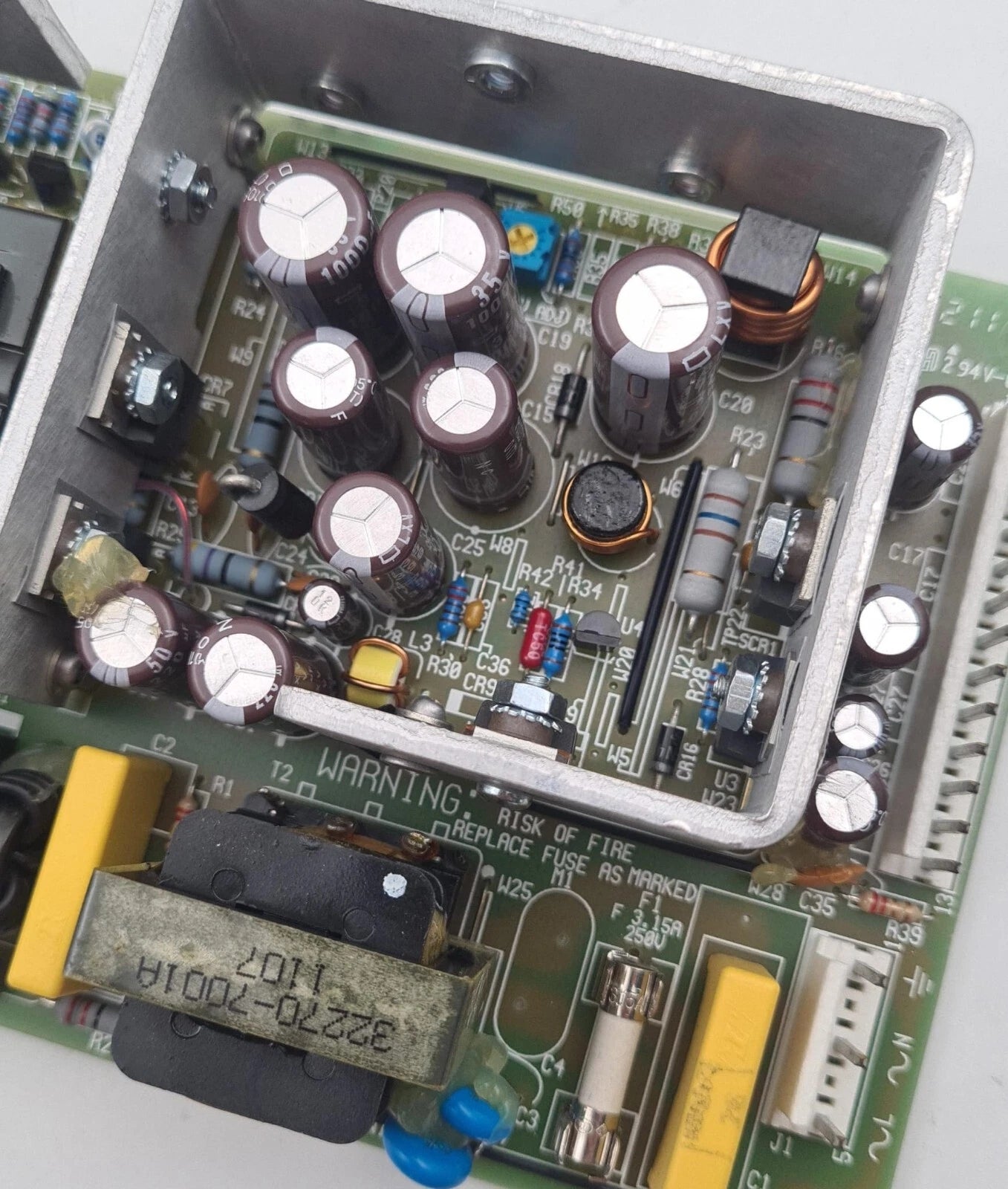 Condor GLC75C-101 internal capacitors and circuitry close-up