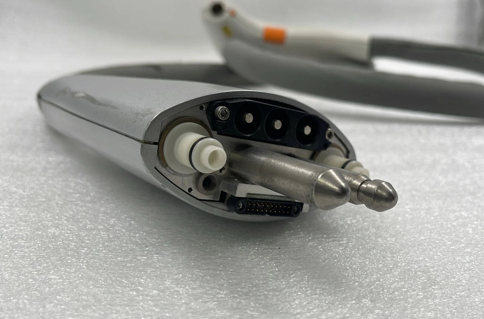 LumeONE laser handpiece cable and interface close-up