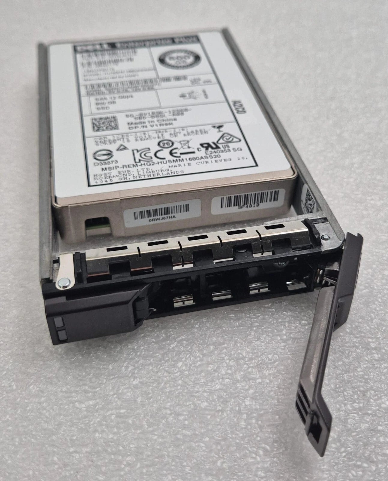 HGST HUSMM1680ASS200 SSD side view with Dell caddy latch
