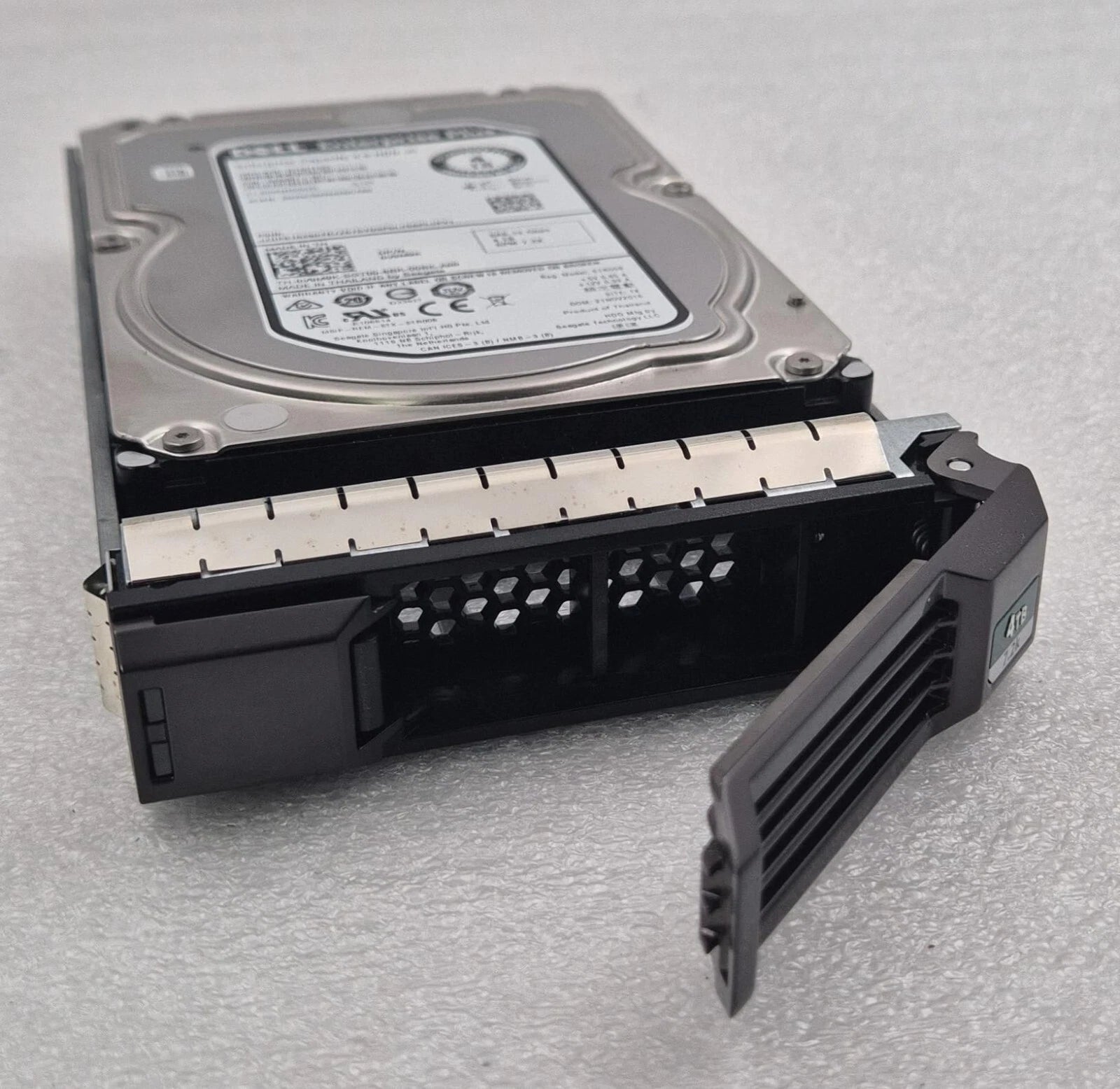 Dell 4TB SAS hard drive with caddy removed