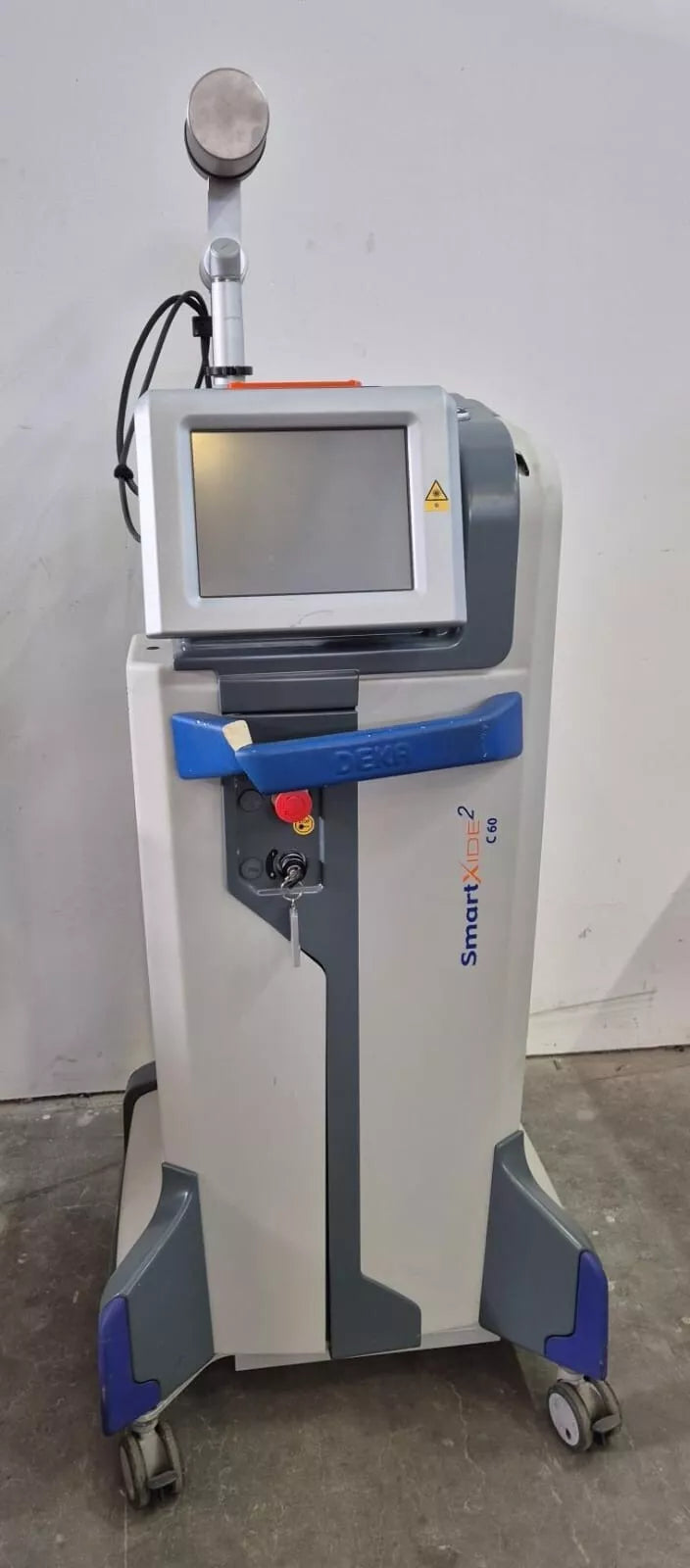 DEKA Smartxide2 M103P1 C60 MonaLisa Touch CO2 laser system with articulated arm and touchscreen interface