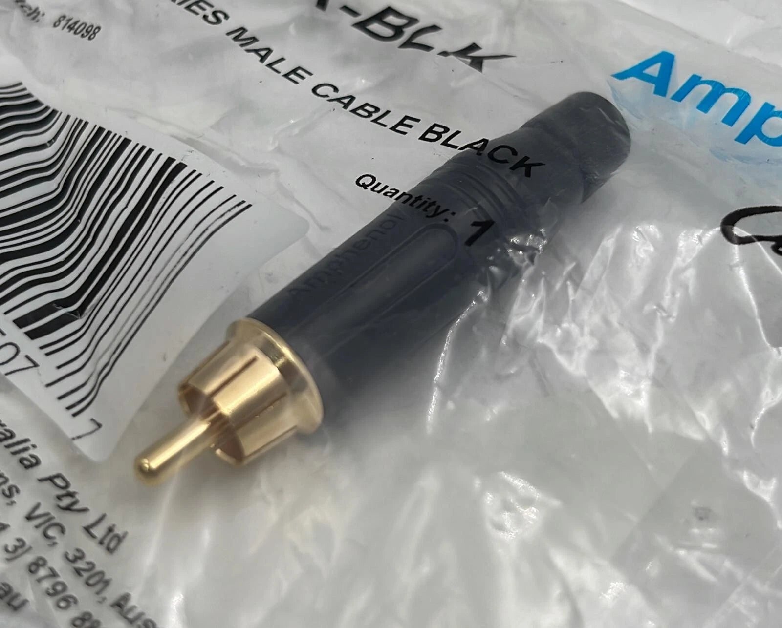 Amphenol ACPR-BLK RCA male connector black housing gold contact tip close-up