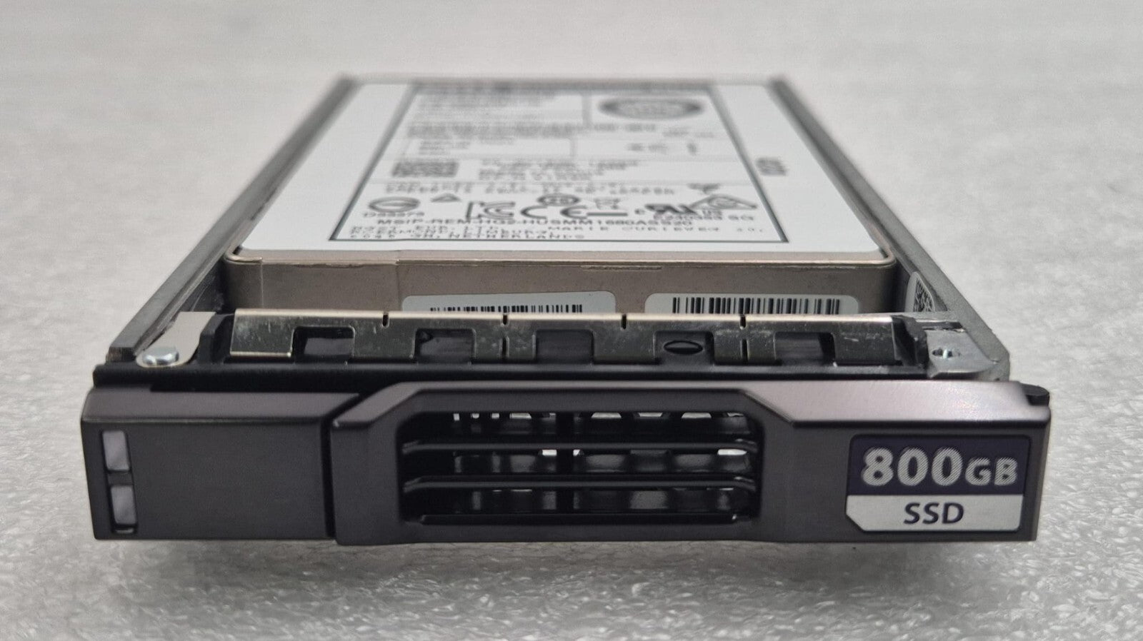 Dell 800GB SAS SSD 2.5 inch in Compellent caddy front angle