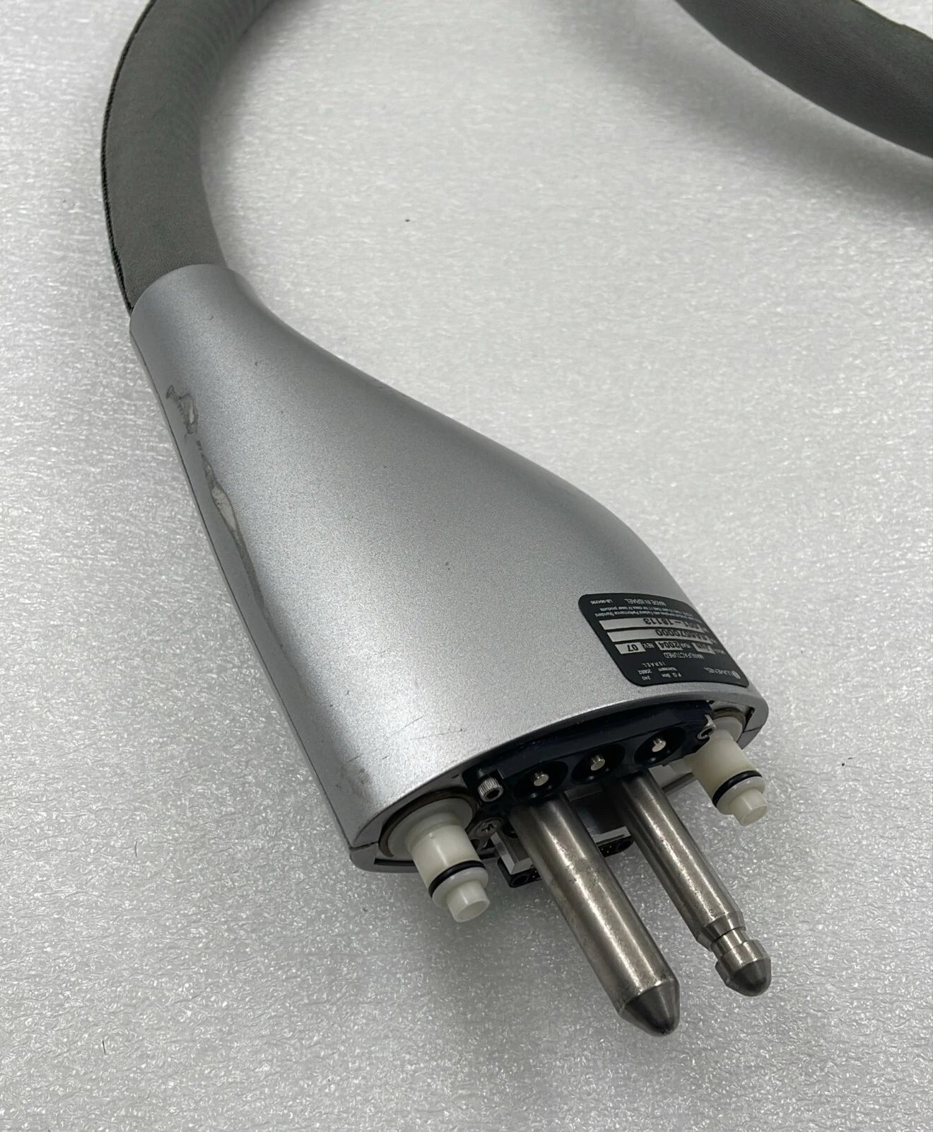 Lumenis LumeONE handpiece multi-pin connector close-up