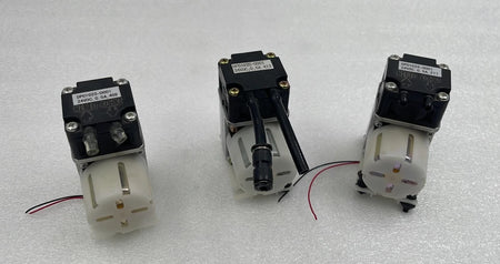 Nitto Kohki DP0102S-0001 diaphragm vacuum pump 24VDC unit
